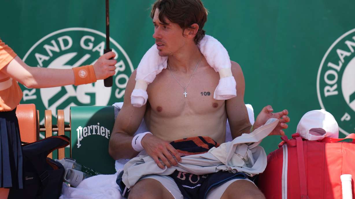 Alex De Minaur of Australia attends a break during the first round men's singles tennis match against Toby Samuel of Britain at the French Open tennis tournament in Paris, Monday, May 25, 2026.