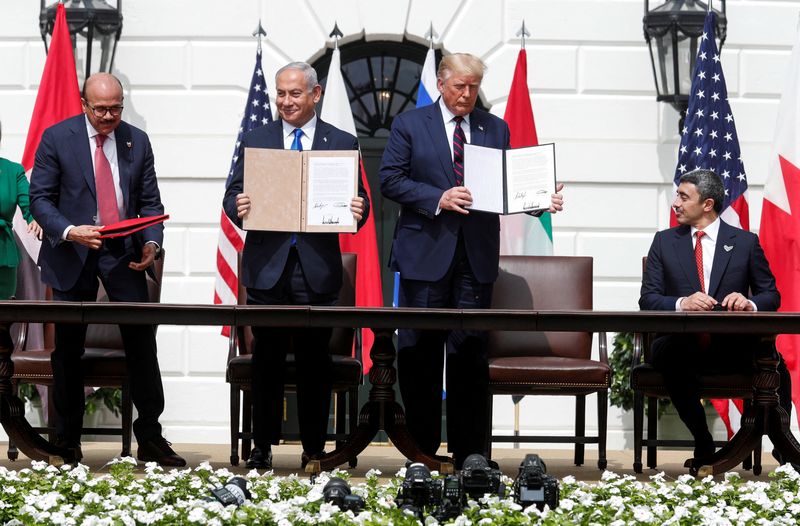Bahrain's Foreign Minister Abdullatif Al Zayani, Israel's Prime Minister Benjamin Netanyahu, President Donald Trump and United Arab Emirates Foreign Minister Abdullah bin Zayed participate in the signing of the Abraham Accords, on the South Lawn of the White House in Washington, Sept. 15, 2020. Trump on Monday reiterated his call to other Arab and Muslim nations to join the accords.