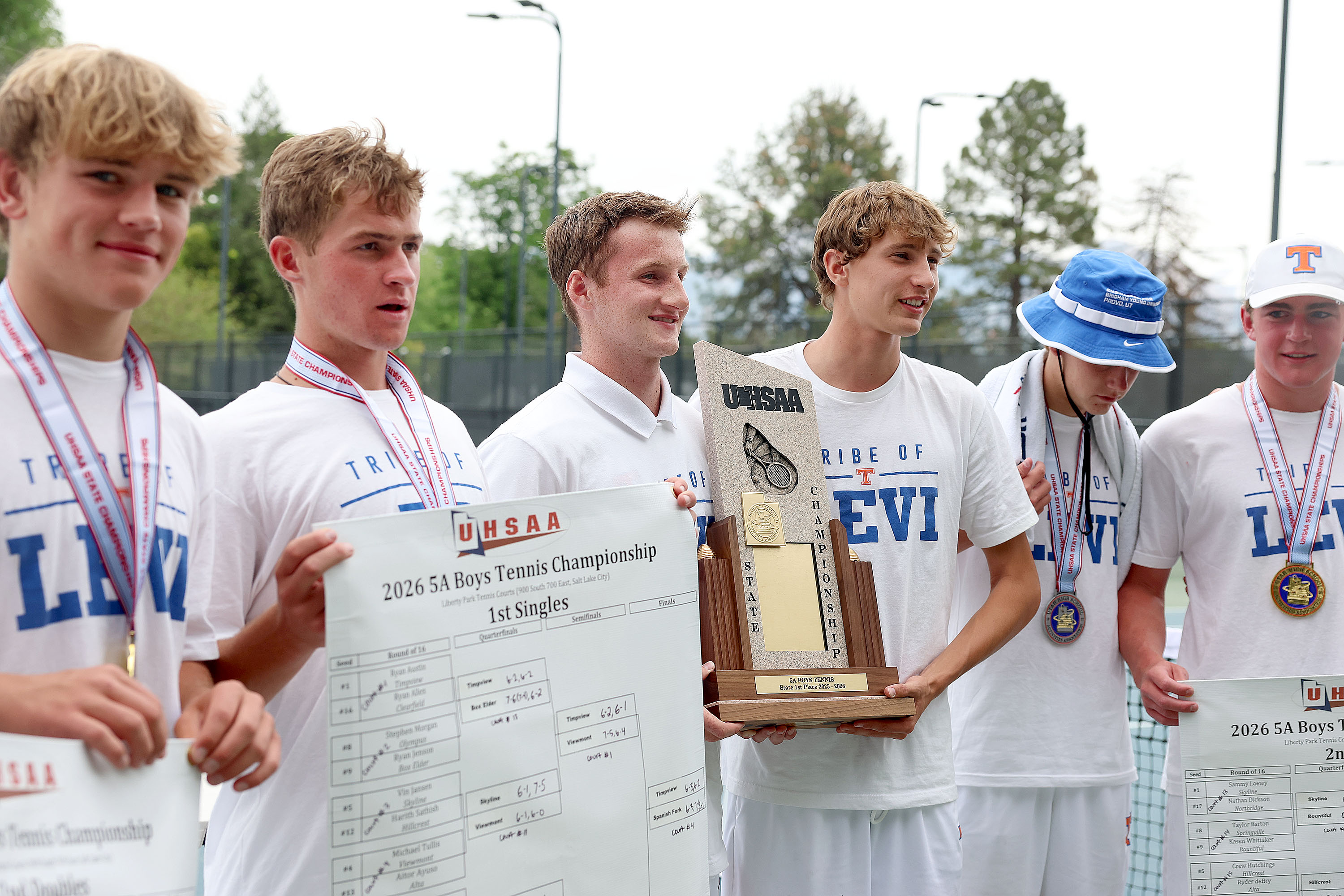 Timpview holds their 5A tennis championship trophy at Liberty Park in Salt Lake City on Saturday, May 16, 2026.
