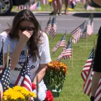 Families gather at Utah Veterans Memorial Cemetery to remember loved ones on Memorial Day