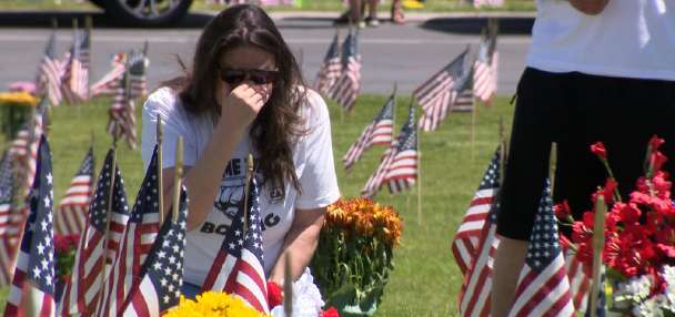 Families gather at Utah Veterans Memorial Cemetery to remember loved ones on Memorial Day