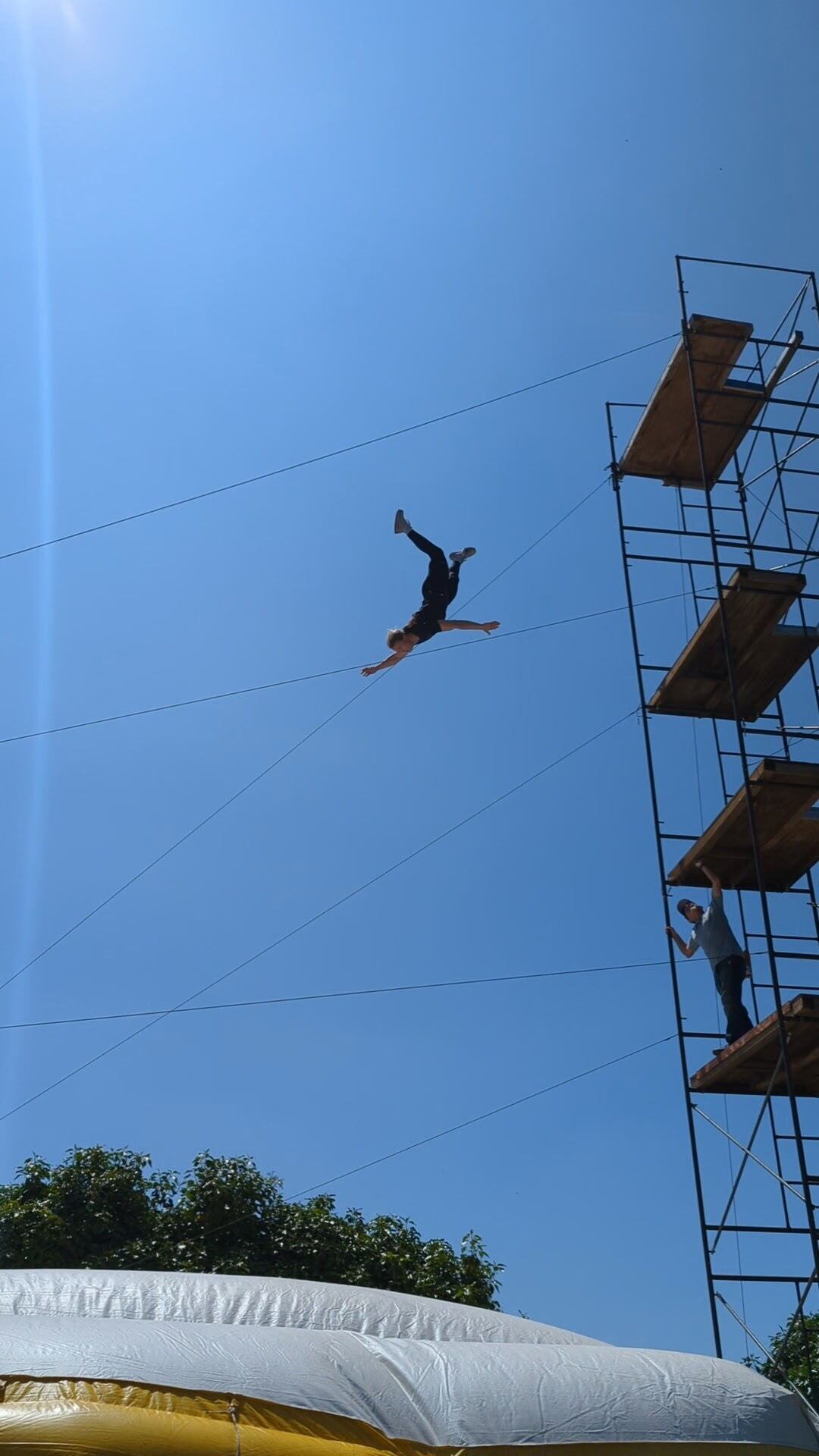 Katelynn Olson practices her high fall at Stunt Performers Academy in Sylmar, Calif., in May 2024. Stunt performers like Olson can work hurt, but they cannot work injured.