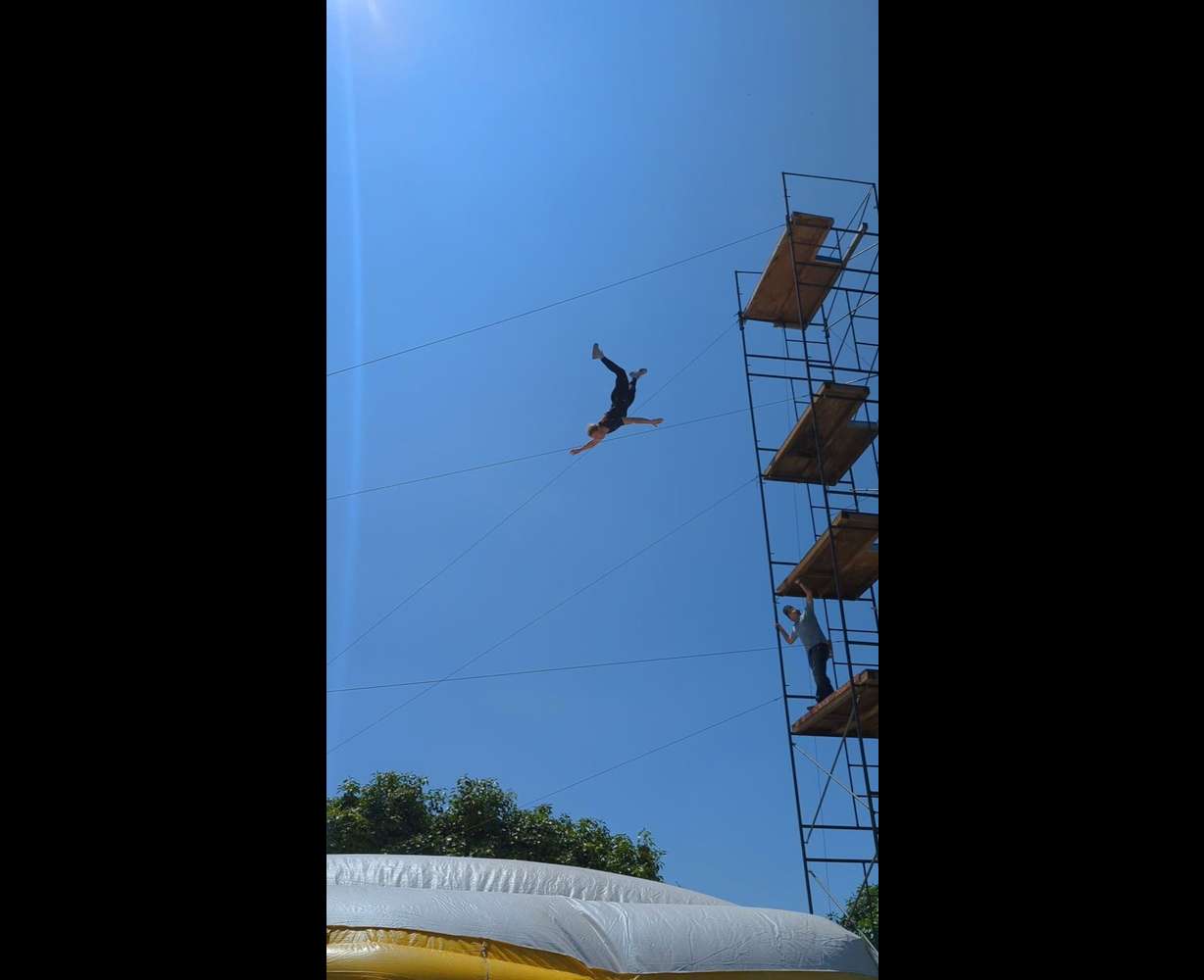 Katelynn Olson practices her high fall at Stunt Performers Academy in Sylmar, Calif., in May 2024. Stunt performers like Olson can work hurt, but they cannot work injured.