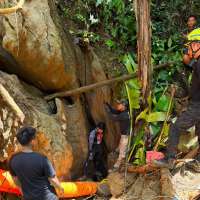 5 of 7 trapped in Laos cave found alive, rescuers say