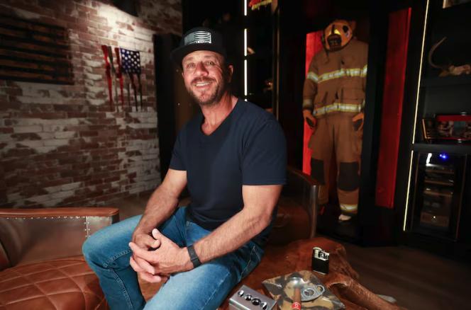 Jeremy Barker, Murphy Door CEO, poses for a portrait in a speakeasy room at Murphy Door in Ogden on May 13.