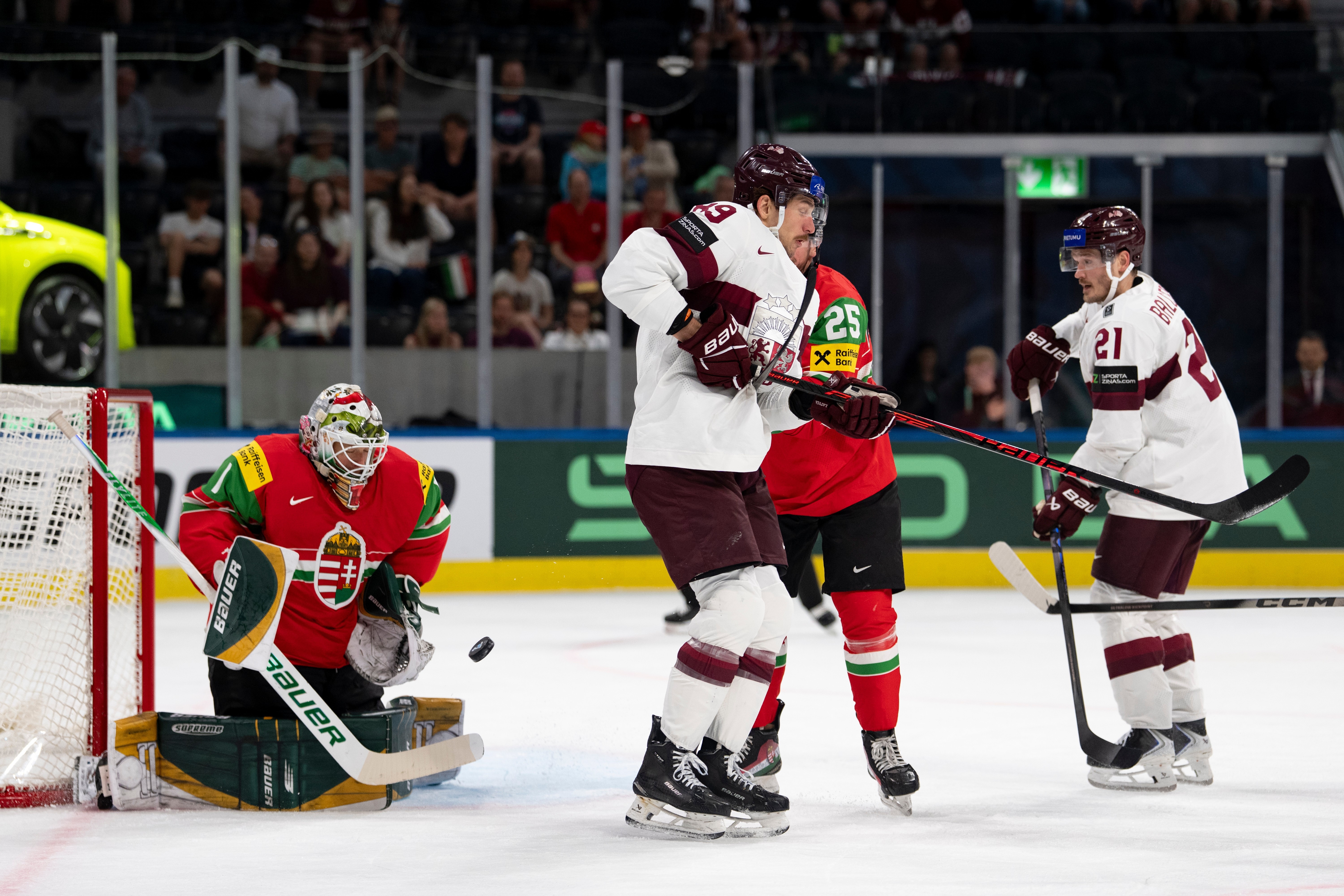 Latvia routs Hungary 8-1 to reach quarterfinals at ice hockey worlds