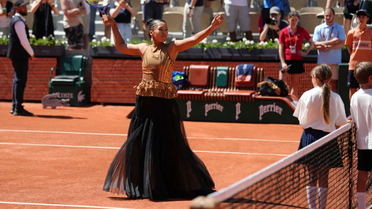 Naomi Osaka of Japan gestures before the first round women's singles tennis match against Laura Siegemund of Germany at the French Open tennis tournament in Paris, Tuesday, May 26, 2026.