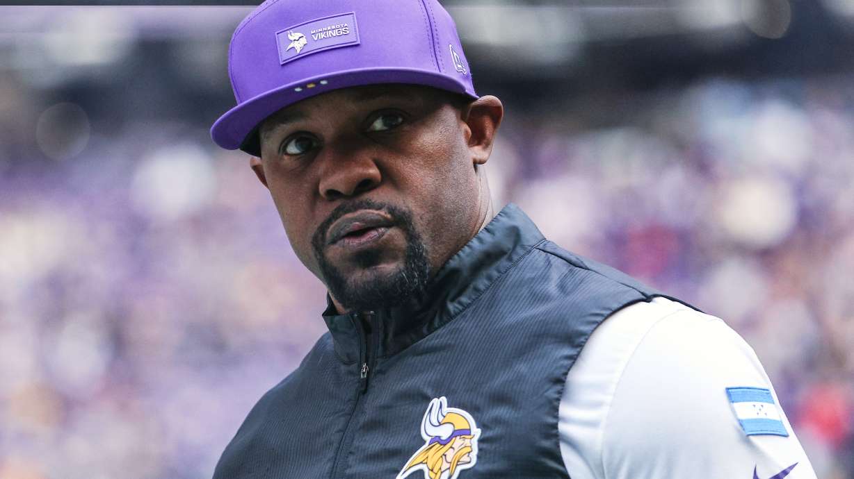 FILE - Minnesota Vikings defensive coordinator Brian Flores stands on the sideline during the first half of an NFL football game against the Chicago Bears, Sunday, Nov. 16, 2025, in Minneapolis.