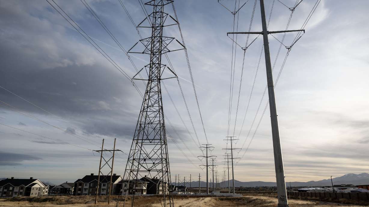 Power lines and transmission lines in the West Jordan area of the Salt Lake Valley on Dec. 22, 2025. Rocky Mountain Power said Tuesday that more temporary blackouts are possible as it handles a potentially active fire season in the state.