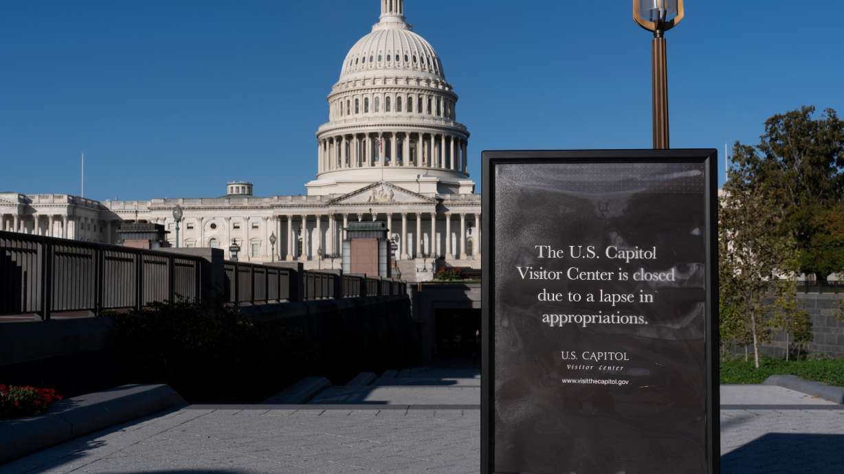 A sign turns away tourists at the entrance to the Capitol Visitor Center during the government shutdown in Washington, Oct. 15. A bipartisan group of senators is renewing calls to keep Congress in Washington during future shutdowns.