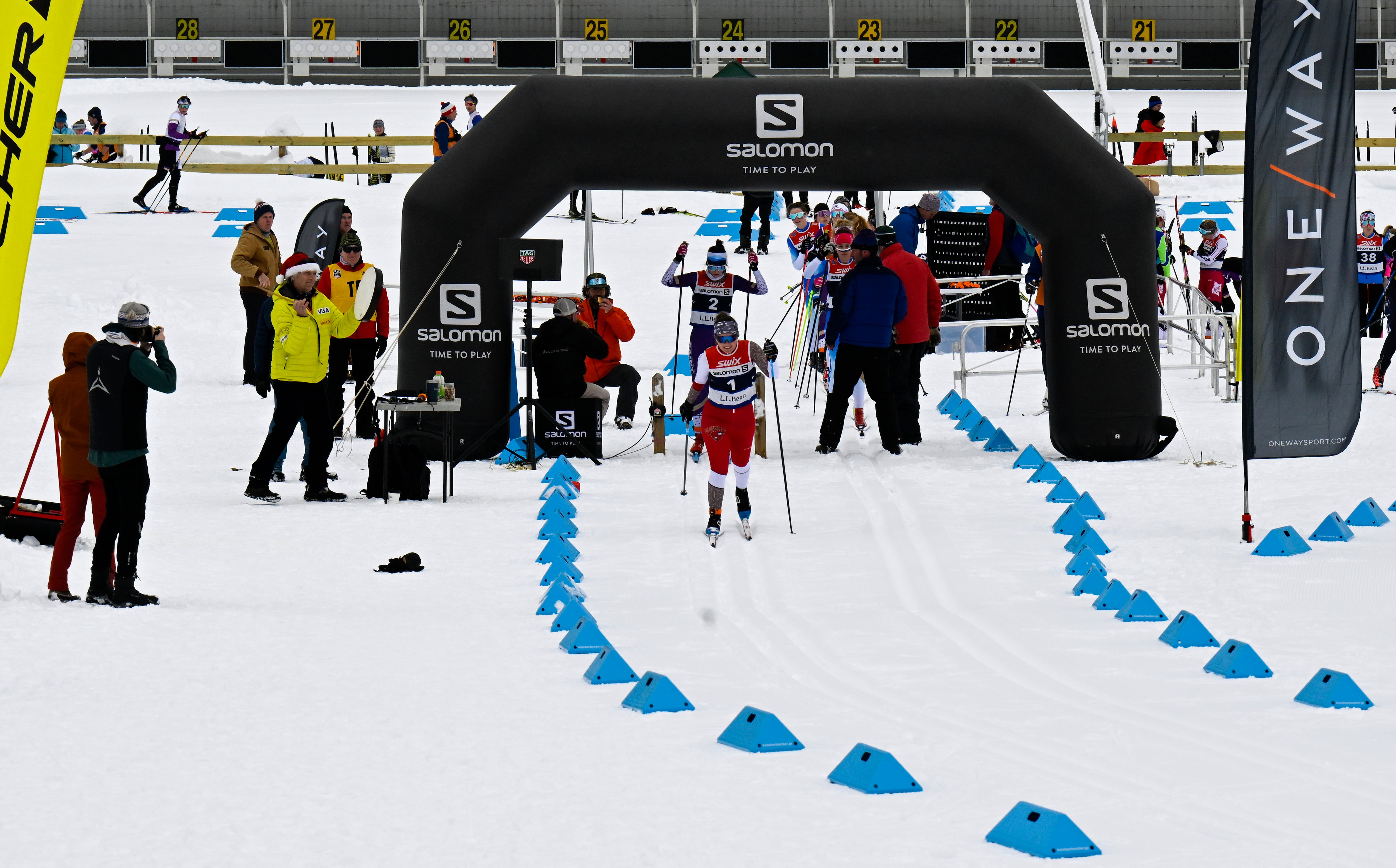 Spectators watch the Grand Prix Eastern Cup cross country ski race in the stadium at the Nordic Center on Mt. Van Hoevenberg, Dec. 17, 2022, in Lake Placid, N.Y. Gov. Kathy Hochul is pushing for New York and Lake Placid to host another Winter Olympics.