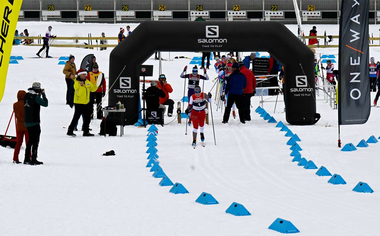 Spectators watch the Grand Prix Eastern Cup cross country ski race in the stadium at the Nordic Center on Mt. Van Hoevenberg, Dec. 17, 2022, in Lake Placid, N.Y. Gov. Kathy Hochul is pushing for New York and Lake Placid to host another Winter Olympics.