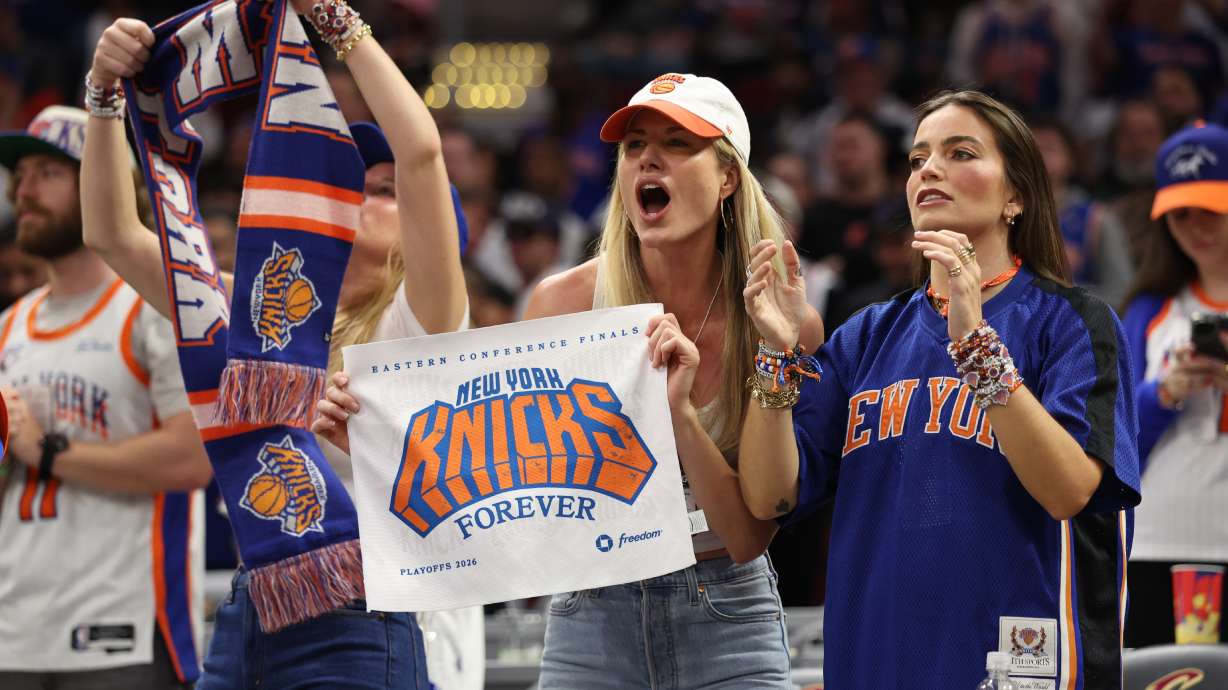 New York Knicks fans cheer during the second half of Game 4 in the Eastern Conference finals NBA basketball playoffs series against the Cleveland Cavaliers in Cleveland, Monday, May 25, 2026.