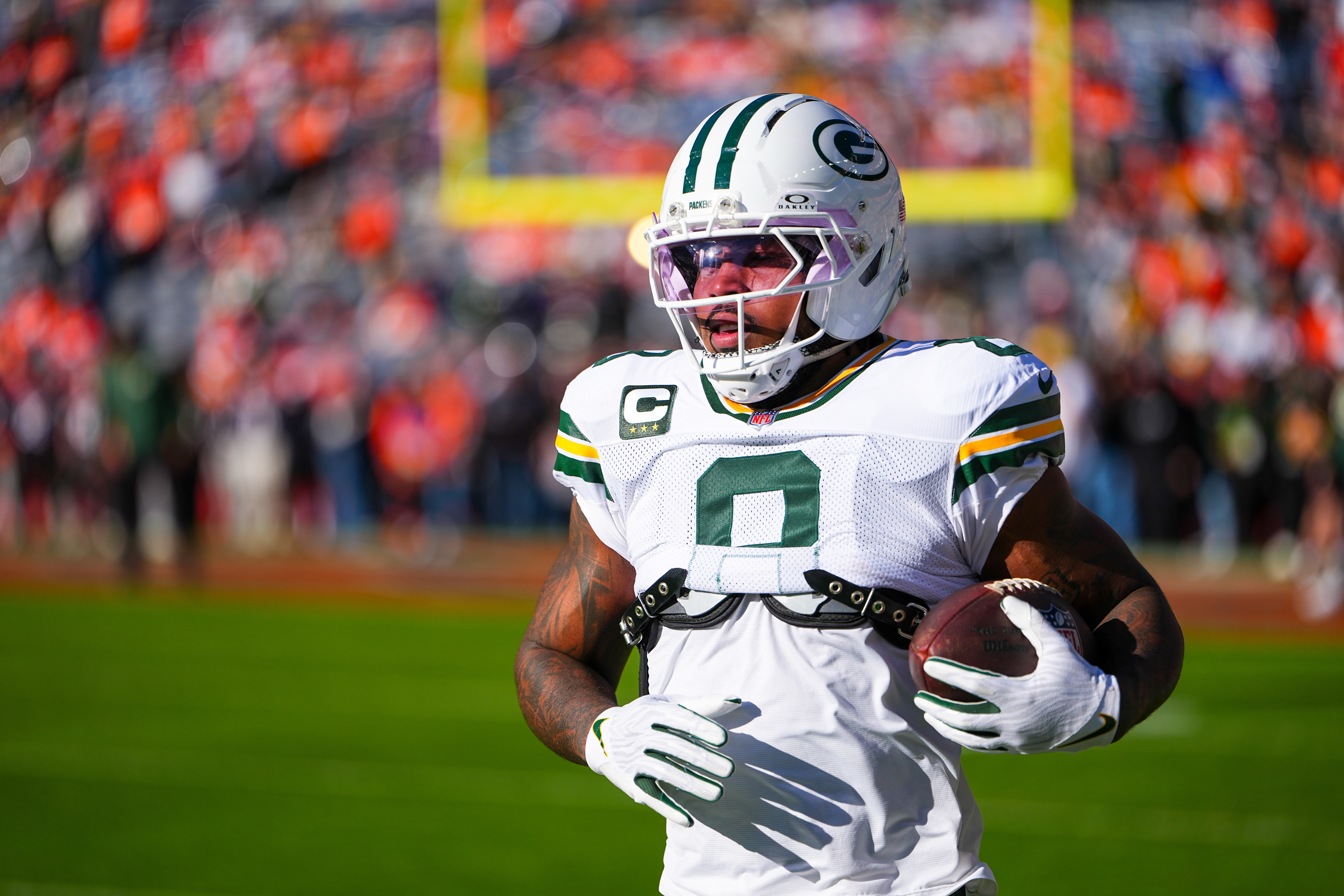 FILE - Green Bay Packers running back Josh Jacobs warms up before an NFL football game against the Denver Broncos, Dec. 14, 2025, in Denver. 