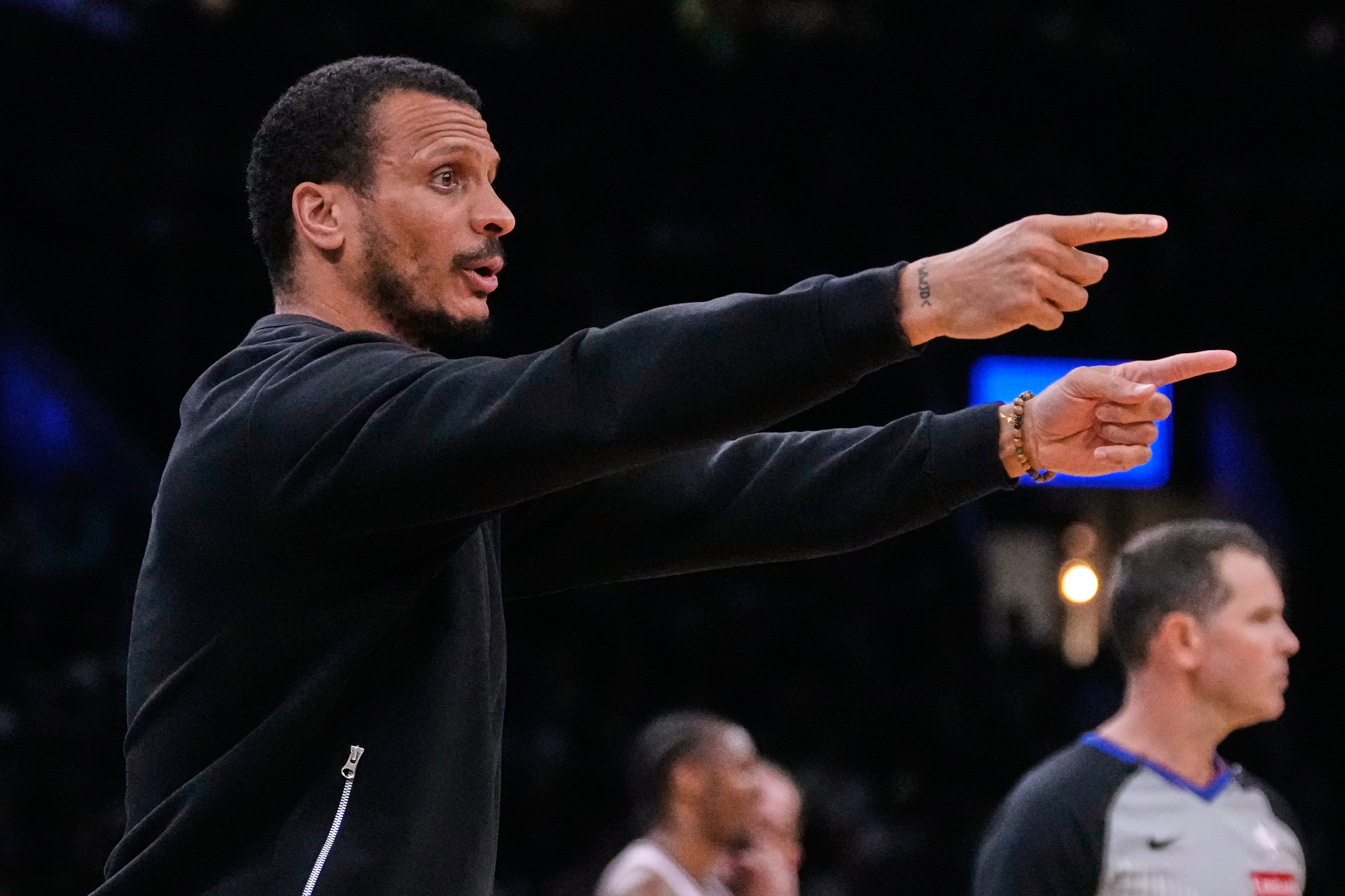 Boston Celtics head coach Joe Mazzulla calls to his players during the first half of Game 5 of a first-round NBA playoffs basketball series against the Philadelphia 76ers, Tuesday, April 28, 2026, in Boston. 