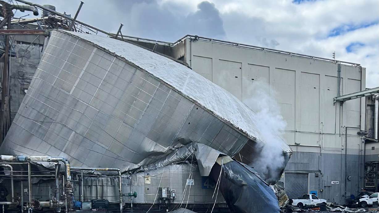 Structural damage to the Nippon Dynawave Packaging Co., after a tank containing hazardous liquid imploded, on Tuesday in Longview, Wash. Authorities confirmed at least one was dead and at least nine others were missing due to the explosion.
