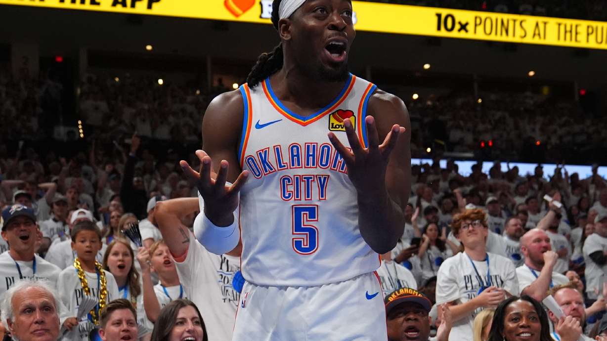 Oklahoma City Thunder guard Luguentz Dort (5) reacts to a foul in the second half of Game 5 in the Western Conference finals NBA basketball playoffs series against the San Antonio Spurs, Tuesday, May 26, 2026, in Oklahoma City.