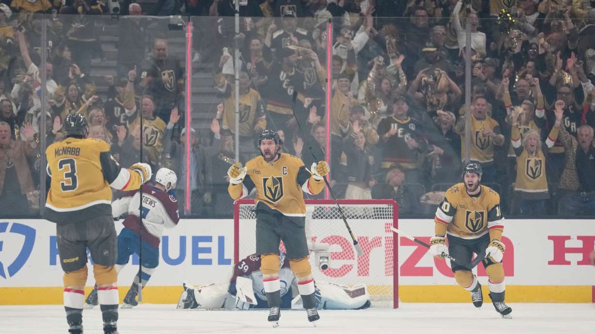 Vegas Golden Knights right wing Mark Stone, middle, celebrates after scoring a goal during the first period in Game 4 of the Western Conference finals NHL hockey Stanley Cup playoff series against the Colorado Avalanche Tuesday, May 26, 2026, in Las Vegas.