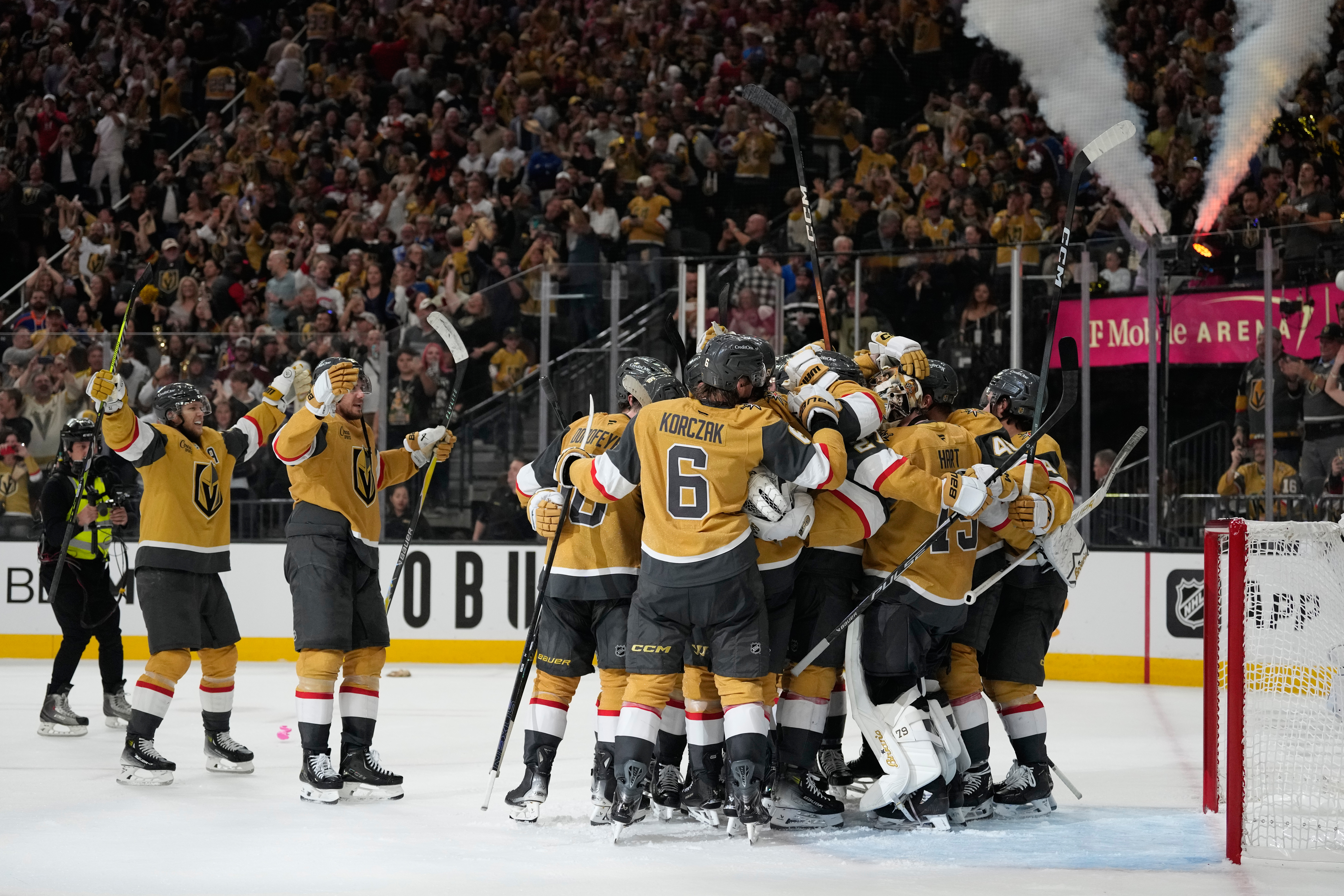 Vegas Golden Knights players celebrate after winning Game 4 of the Western Conference finals NHL hockey Stanley Cup playoff series against the Colorado Avalanche Tuesday, May 26, 2026, in Las Vegas. 