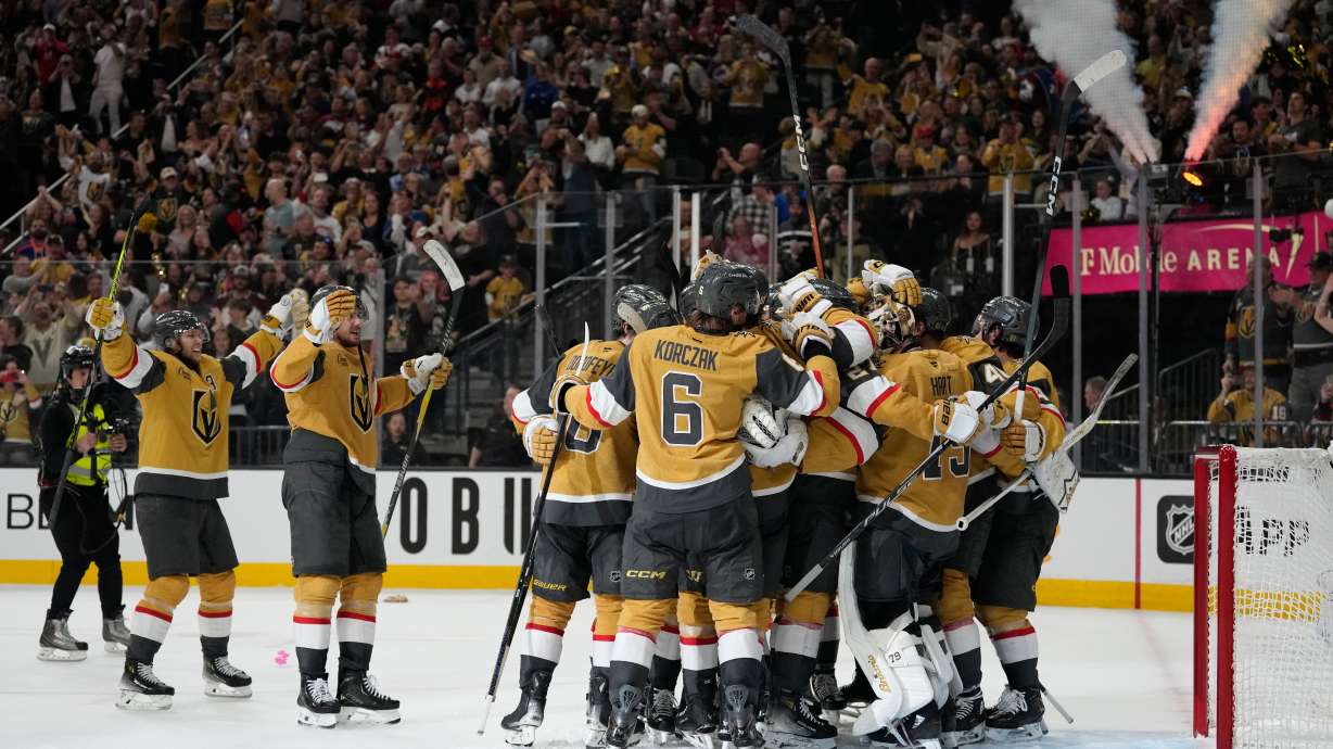 Vegas Golden Knights players celebrate after winning Game 4 of the Western Conference finals NHL hockey Stanley Cup playoff series against the Colorado Avalanche Tuesday, May 26, 2026, in Las Vegas.