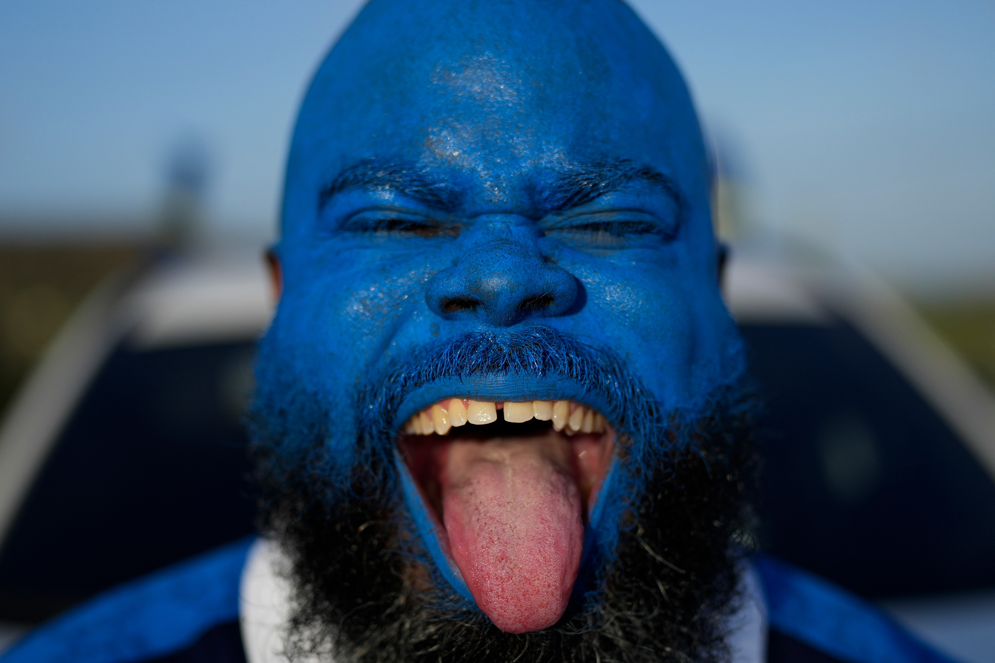 Brenton Balentien, known as Blue Face, a leader of supporters of Curacao’s national soccer team, poses wearing face paint in the team’s colors in Willemstad, Curacao, Saturday, May 16, 2026. 