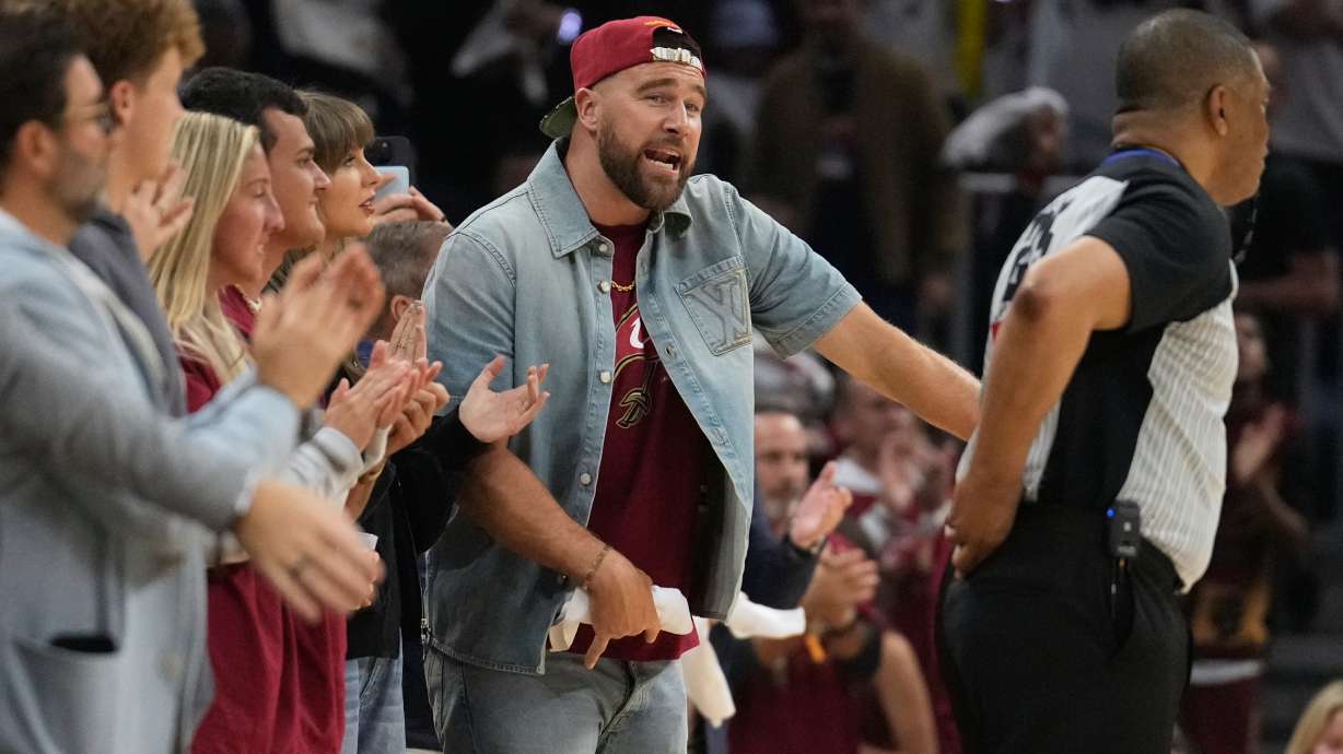 Travis Kelce reacts during the second half of Game 3 in the Eastern Conference finals NBA basketball playoffs series between the New York Knicks and the Cleveland Cavaliers in Cleveland, Saturday, May 23, 2026.