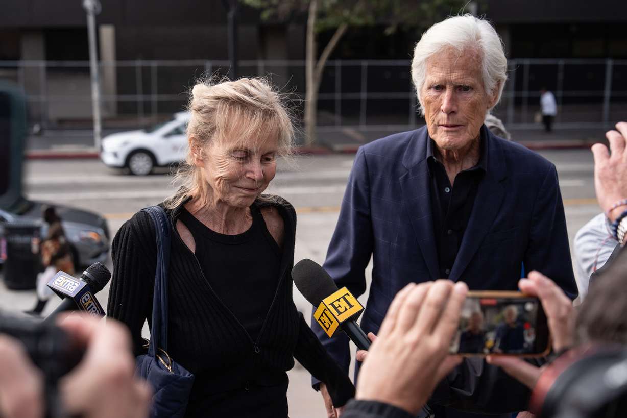 Matthew Perry's mother, Suzanne Morrison, and Keith Morrison arrive at federal court for the sentencing of Kenneth Iwamasa, one of five people who pleaded guilty in connection with the ketamine overdose death of the actor, in Los Angeles, Wednesday. The Morrisons largely blamed Iwamasa for Perry's death at Iwamasa's sentencing.
