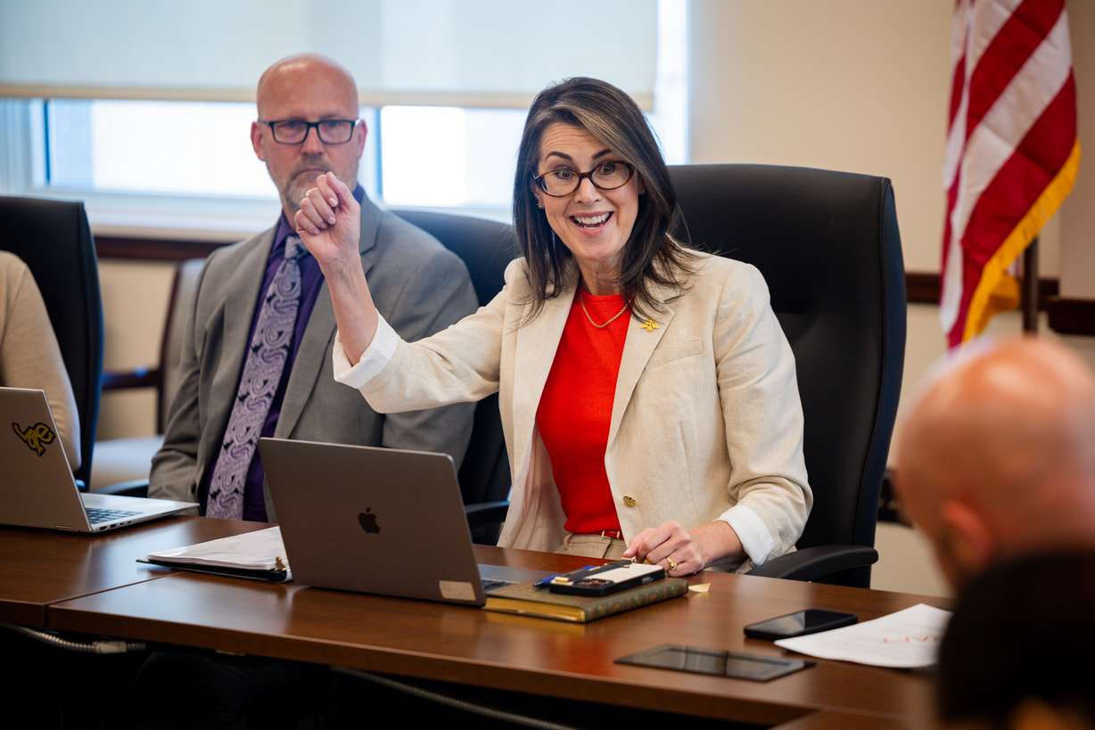 Utah Lt. Gov. Deidre Henderson, center, speaks during a roundtable to discuss the completion of the citizenship audit of Utah's voter registration rolls at the state Capitol in Salt Lake City on Wednesday.