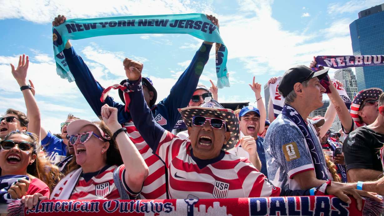 Fans celebrate during the announcement of the United States men's national soccer team roster, Tuesday, May 26, 2026, in New York, ahead of the FIFA World Cup soccer tournament.