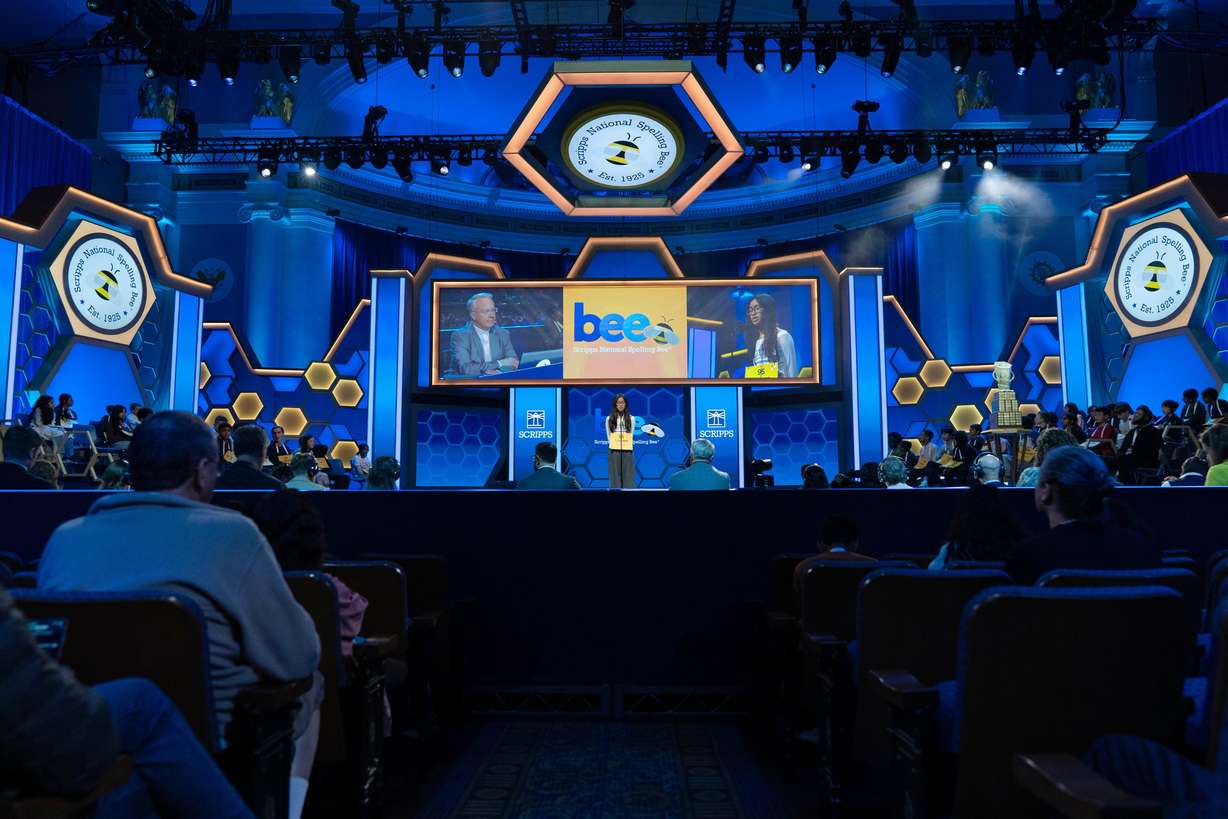 Lauren Merillana, 14, of North Potomac, Md., spells her word during the semifinals of the Scripps National Spelling Bee at DAR Constitution Hall, Wednesday, in Washington. The bee underwent significant changes to give it a "big-game feel."