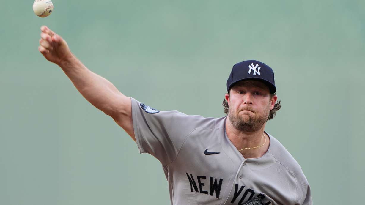 New York Yankees starting pitcher Gerrit Cole throws during the first inning of baseball game against the Kansas City Royals, Wednesday, May 27, 2026, in Kansas City, Mo.