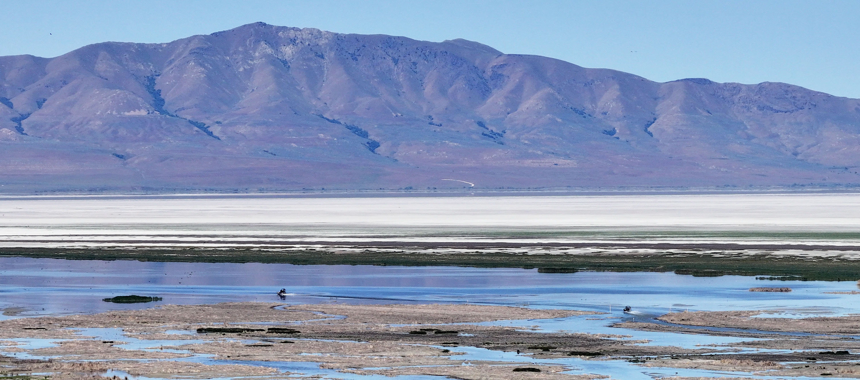 Sen. John Curtis and Tim Davis, Utah Department of Environmental Quality executive director, host EPA Administrator Lee Zeldin and others on an airboat tour of the Great Salt Lake near Farmington Bay on Saturday. A recent Deseret News poll showed concern about the lake's level reached new heights.