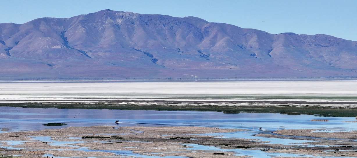 Sen. John Curtis and Tim Davis, Utah Department of Environmental Quality executive director, host EPA Administrator Lee Zeldin and others on an airboat tour of the Great Salt Lake near Farmington Bay on Saturday. A recent Deseret News poll showed concern about the lake's level reached new heights.