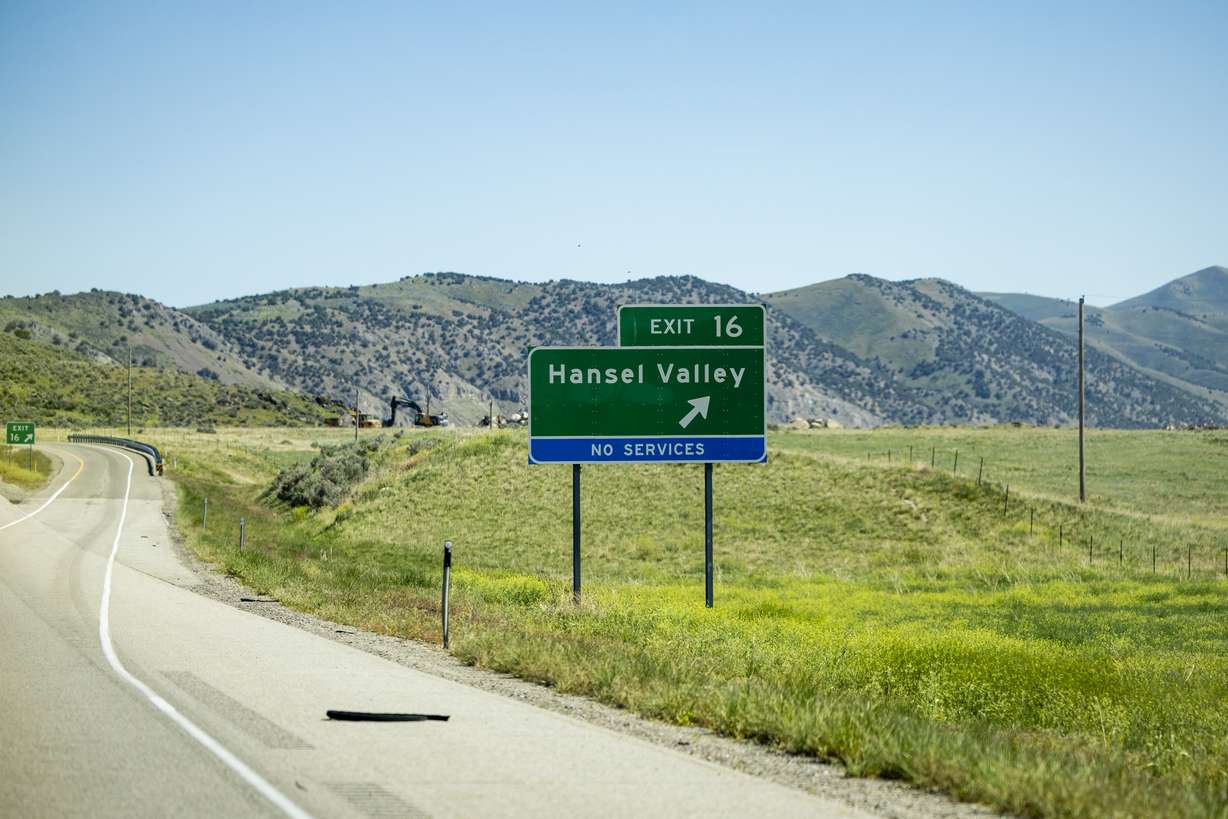 An interstate exit sign is posted near land proposed for the Stratos Project data center in the Hansel Valley area of Box Elder County on May 12. A new poll showed 53% of Utahns opposed the project because of water usage concerns.