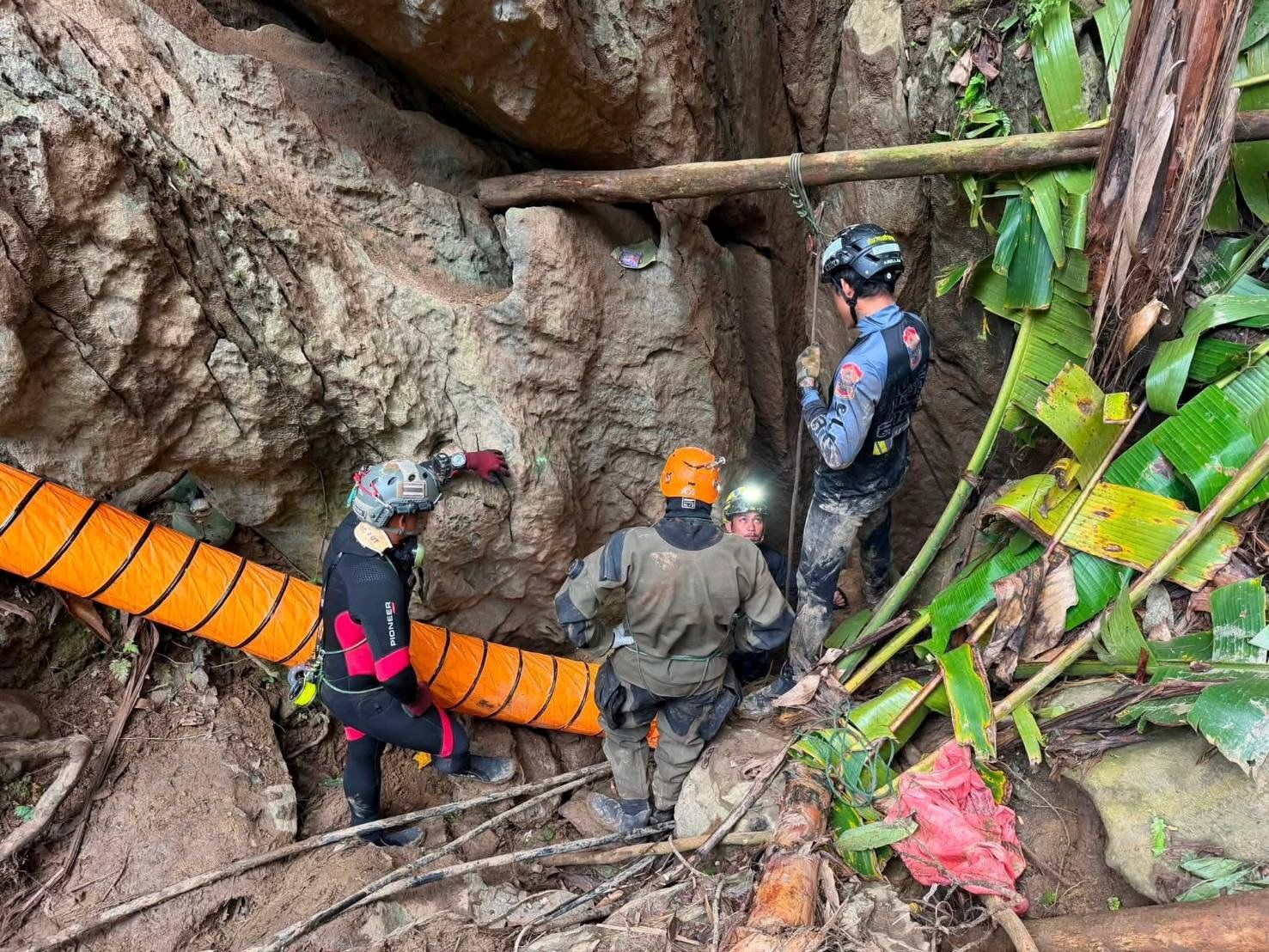 Trapped looking for gold in a flooded cave. How were they found and will they be rescued?