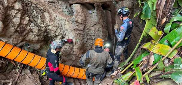 Trapped looking for gold in a flooded cave. How were they found and will they be rescued?