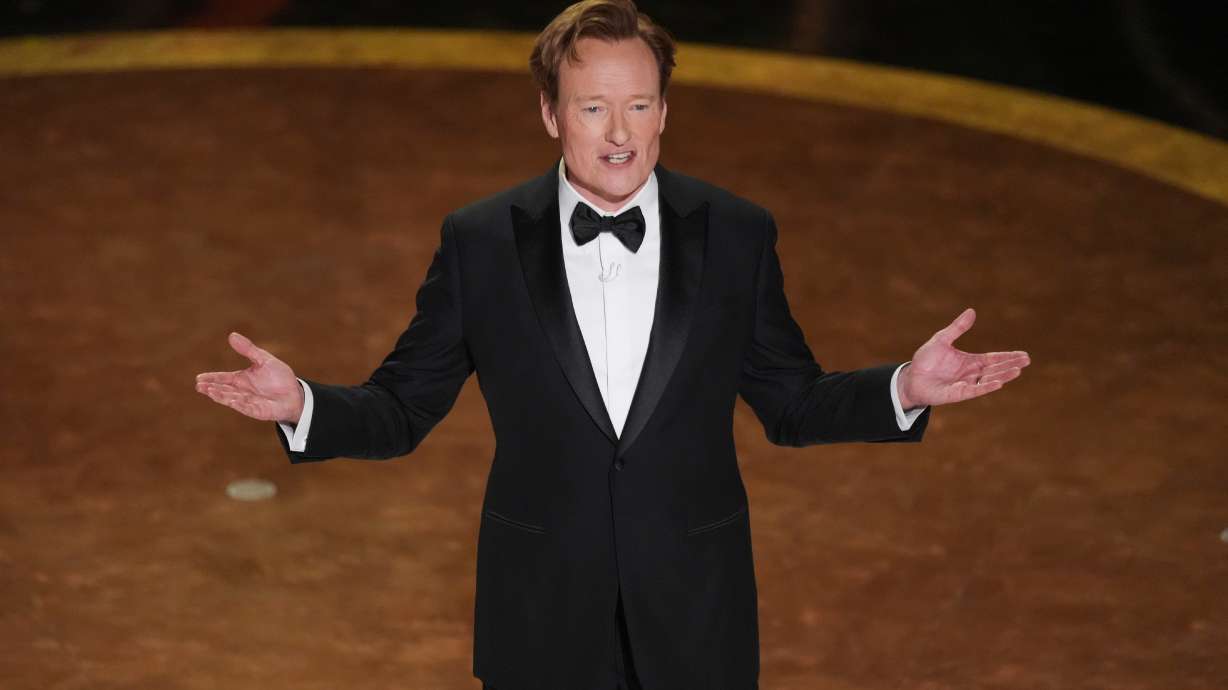 Host Conan O'Brien speaks at the Oscars in Los Angeles on March 2, 2025. O'Brien will entertain Harvard University graduates at their commencement on Thursday, as the Ivy League school is in the crosshairs of the Trump administration.
