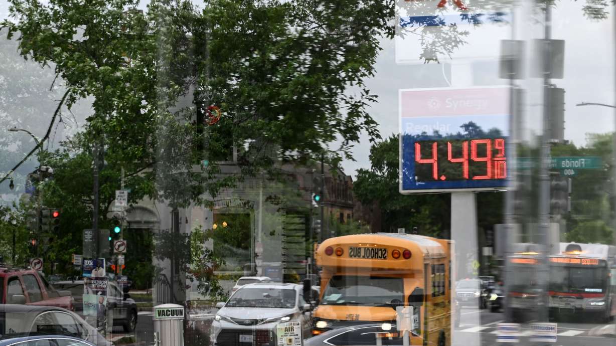 A sign displays the price of unleaded gasoline at an Exxon gas station in Washington on May 21.