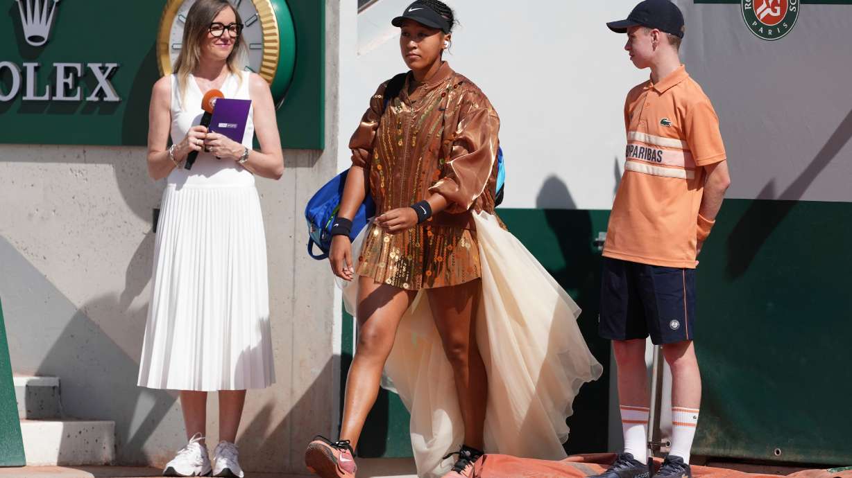 Naomi Osaka of Japan enters the court for the second round women's singles tennis match against Donna Vekic of Croatia at the French Open tennis tournament in Paris, Thursday, May 28, 2026.