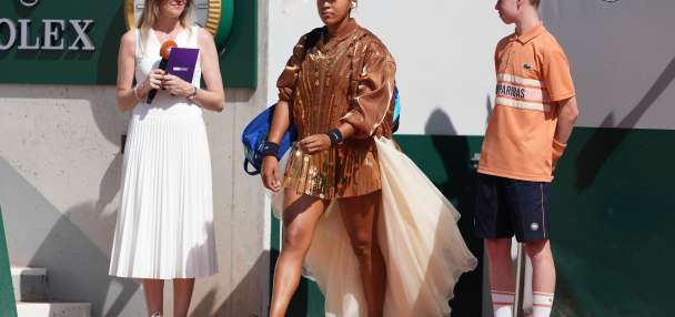 Naomi Osaka's latest French Open fashion ensemble includes ivory train and gold jacket