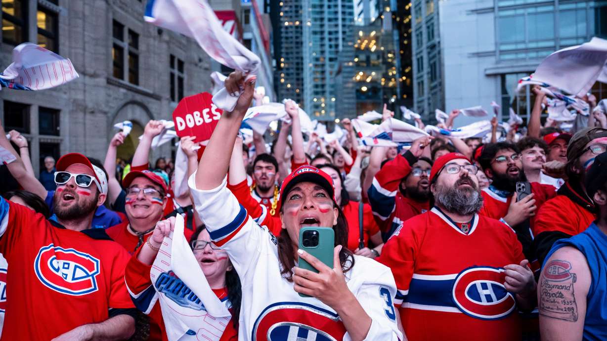 Fans cheer on the Montreal Canadiens during first period NHL playoff hockey game between the Montreal Canadiens and the Carolina Hurricanes in Montreal on Wednesday, May 27, 2026.