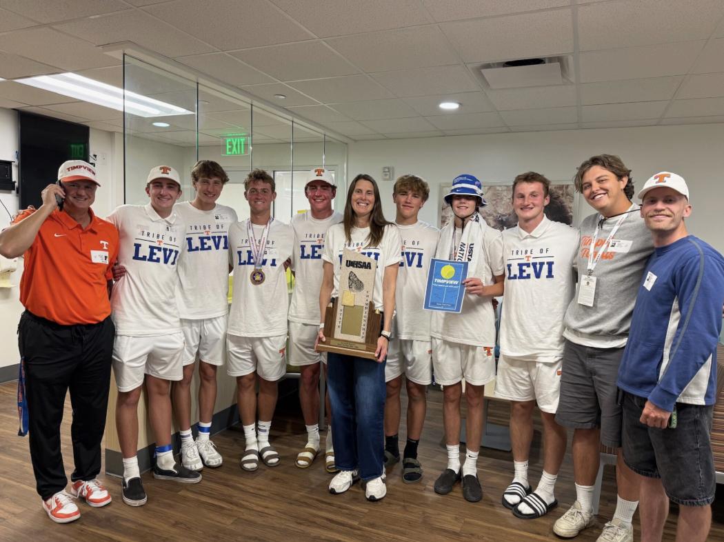 The Timpview High School Tennis team visited the hospital after winning the state championship title. Levi, a sophomore, is a member of the varsity team.
