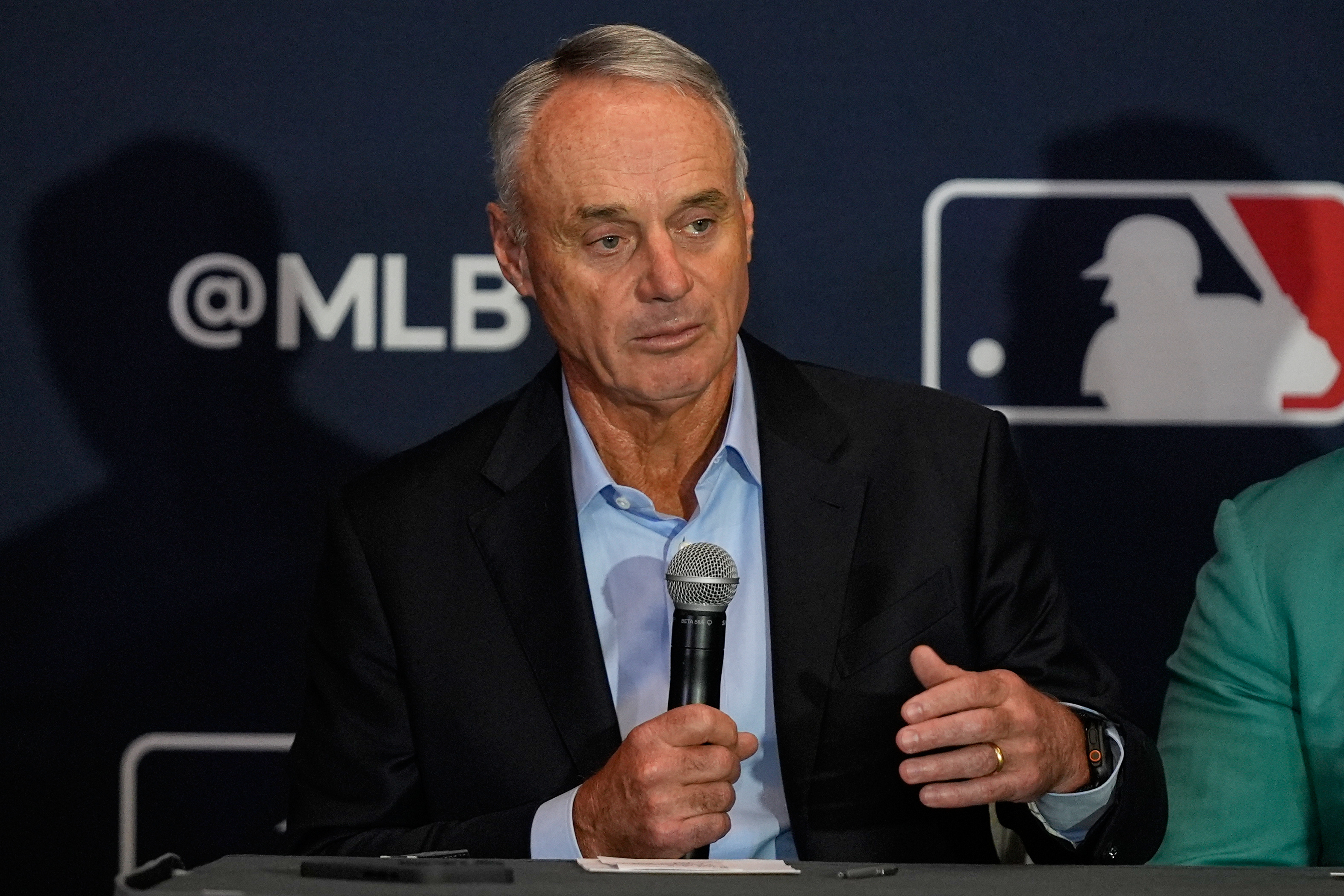 FILE - Rob Manfred, commissioner of Major League Baseball answers questions during a news conference at the MLB winter meetings, Dec. 8, 2025, in Orlando, Fla. 