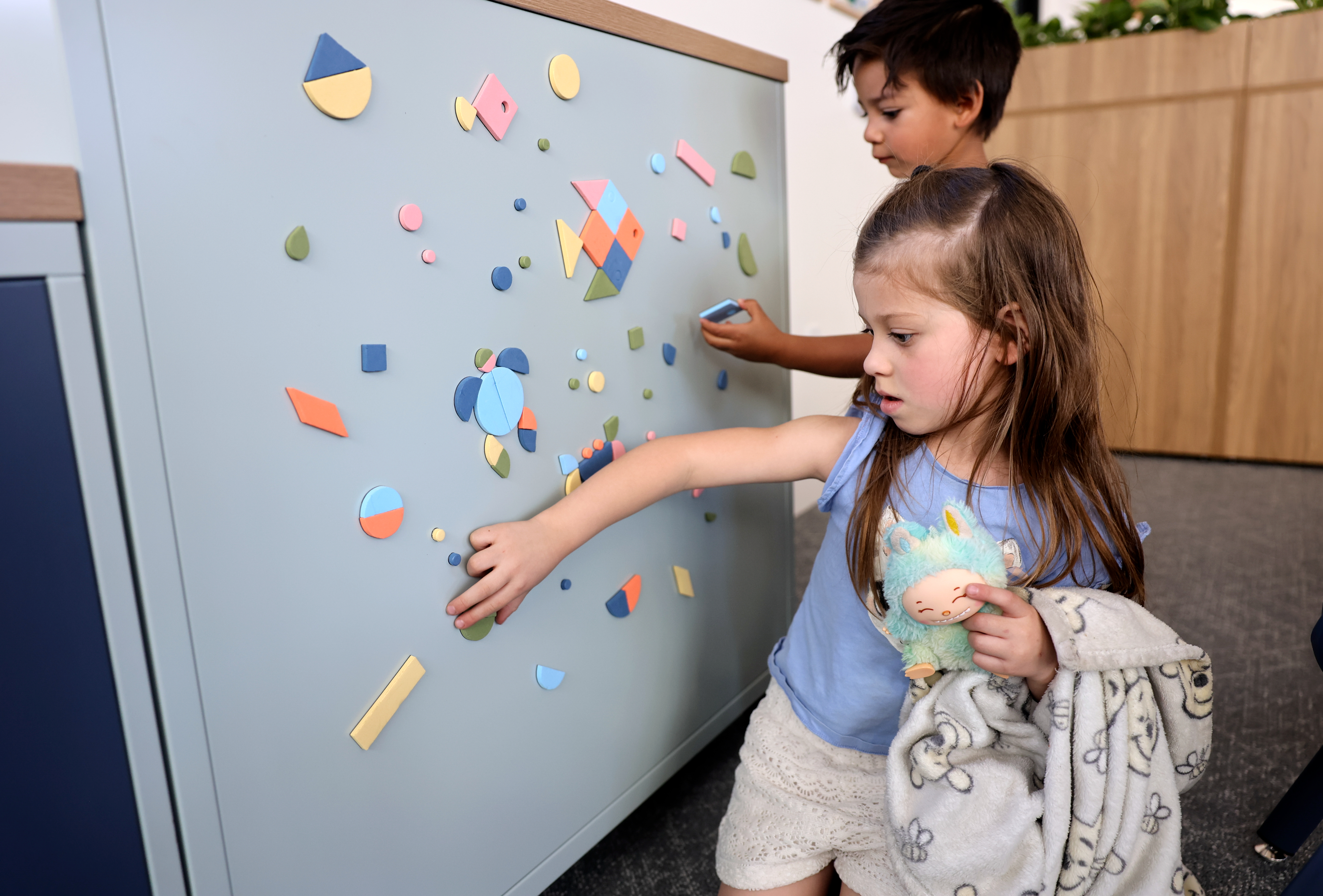 Charlotte Wanlass and Zander Wanlass play in the new Lehi Literacy Center in Lehi on Thursday.