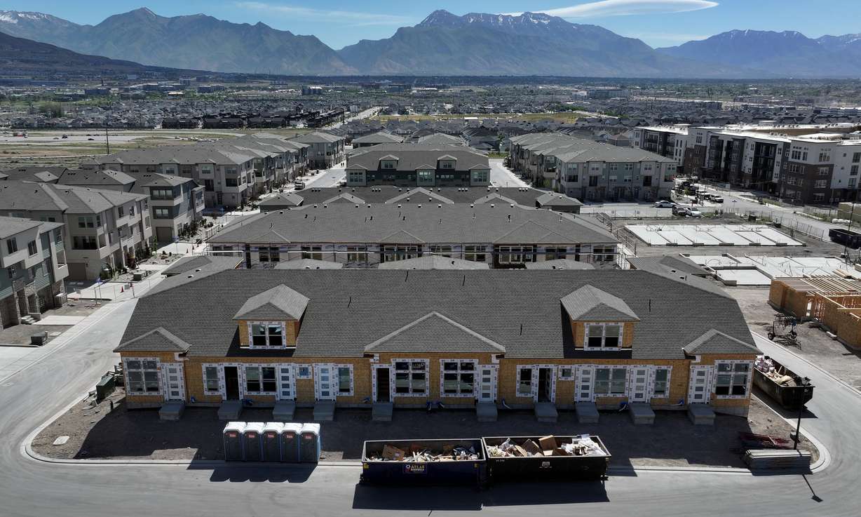 Housing is under construction at Innovation Park at Holbrook Farms in Lehi on Thursday.