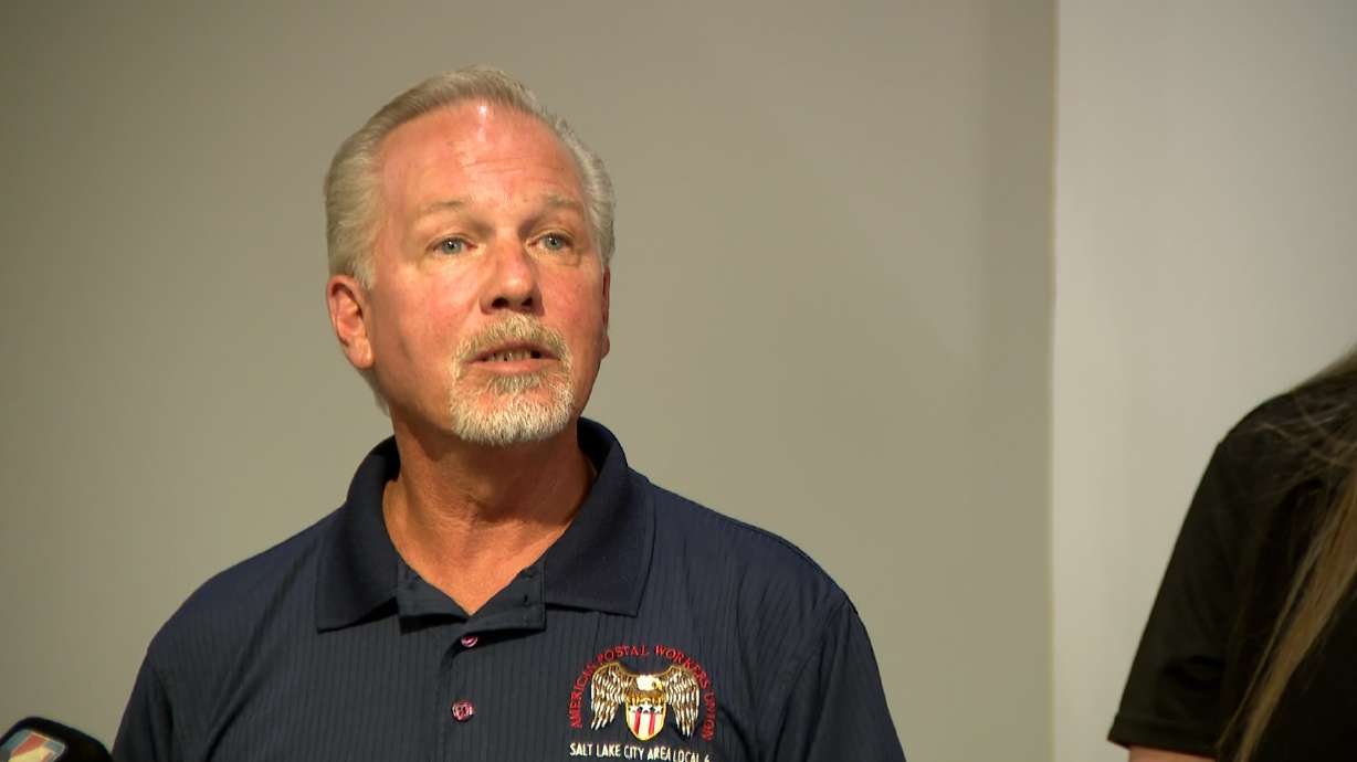 Russ Franklin, president of the Salt Lake City Area Local 6 of the American Postal Workers Union, speaks to reporters at the Hilton Salt Lake City Center on Thursday.