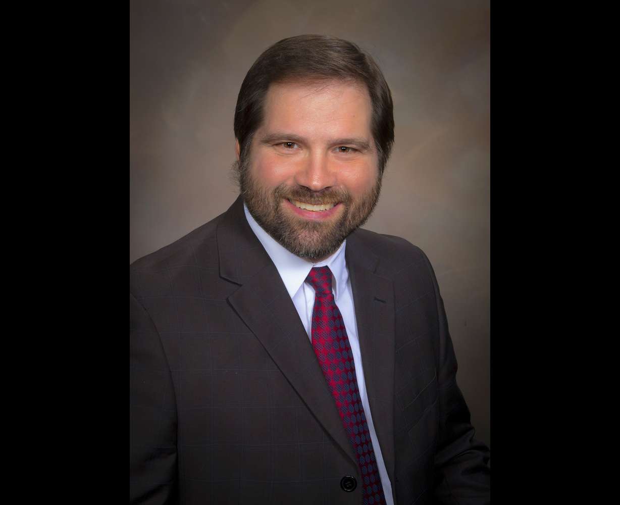 Weber County Clerk/Auditor Ricky Hatch is one of the targets of a lawsuit filed Wednesday by three Weber County Commission hopefuls trying to remove a fourth candidate from the ballot.