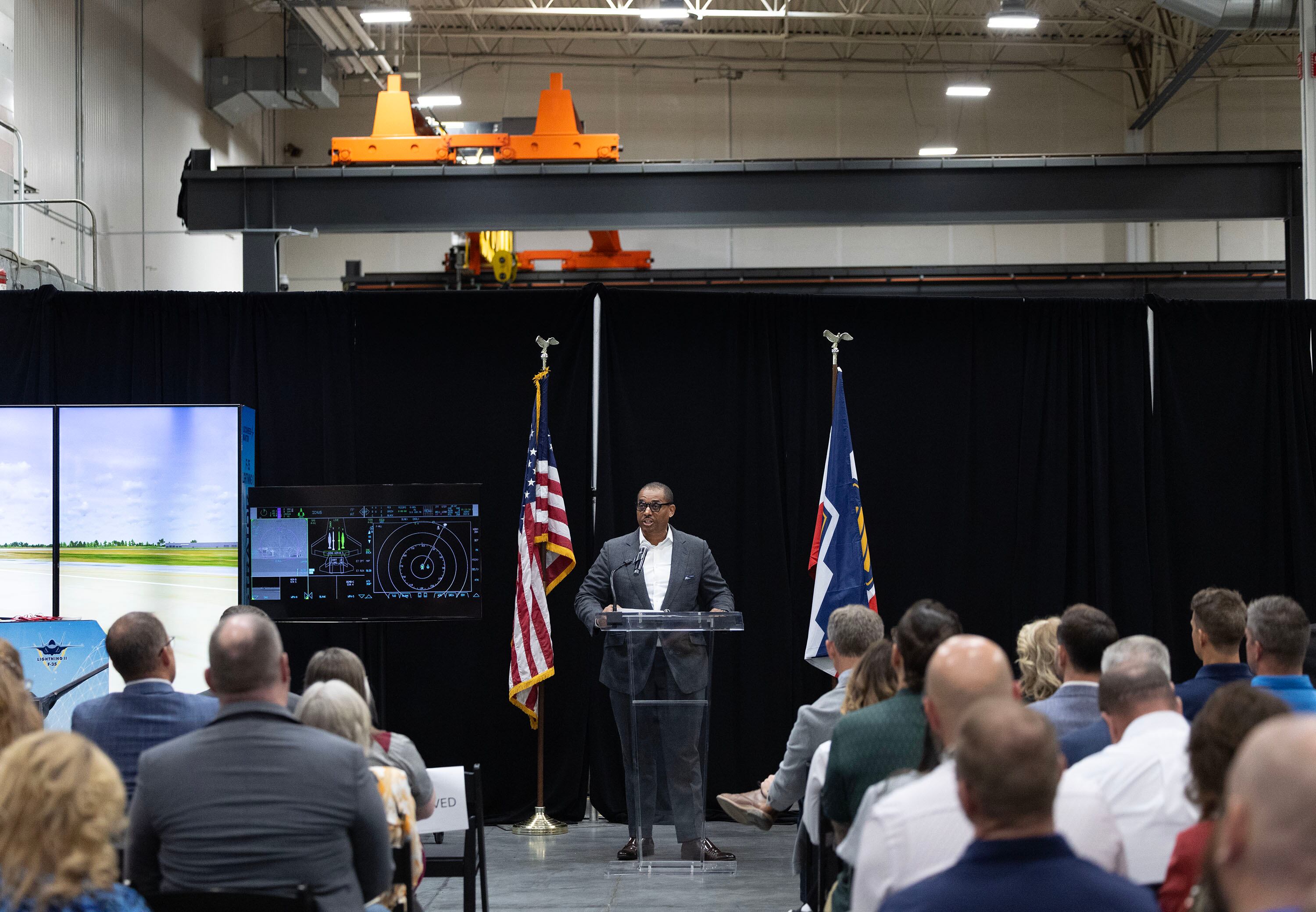Chauncey McIntosh, vice president and deputy of the F-35 Lightning II program for Lockheed Martin Aeronautics, speaks at an event highlighting F-35s at Janicki Industries in Layton on Thursday. McIntosh called the F-35 the "tip of the spear to penetrate" for the military.