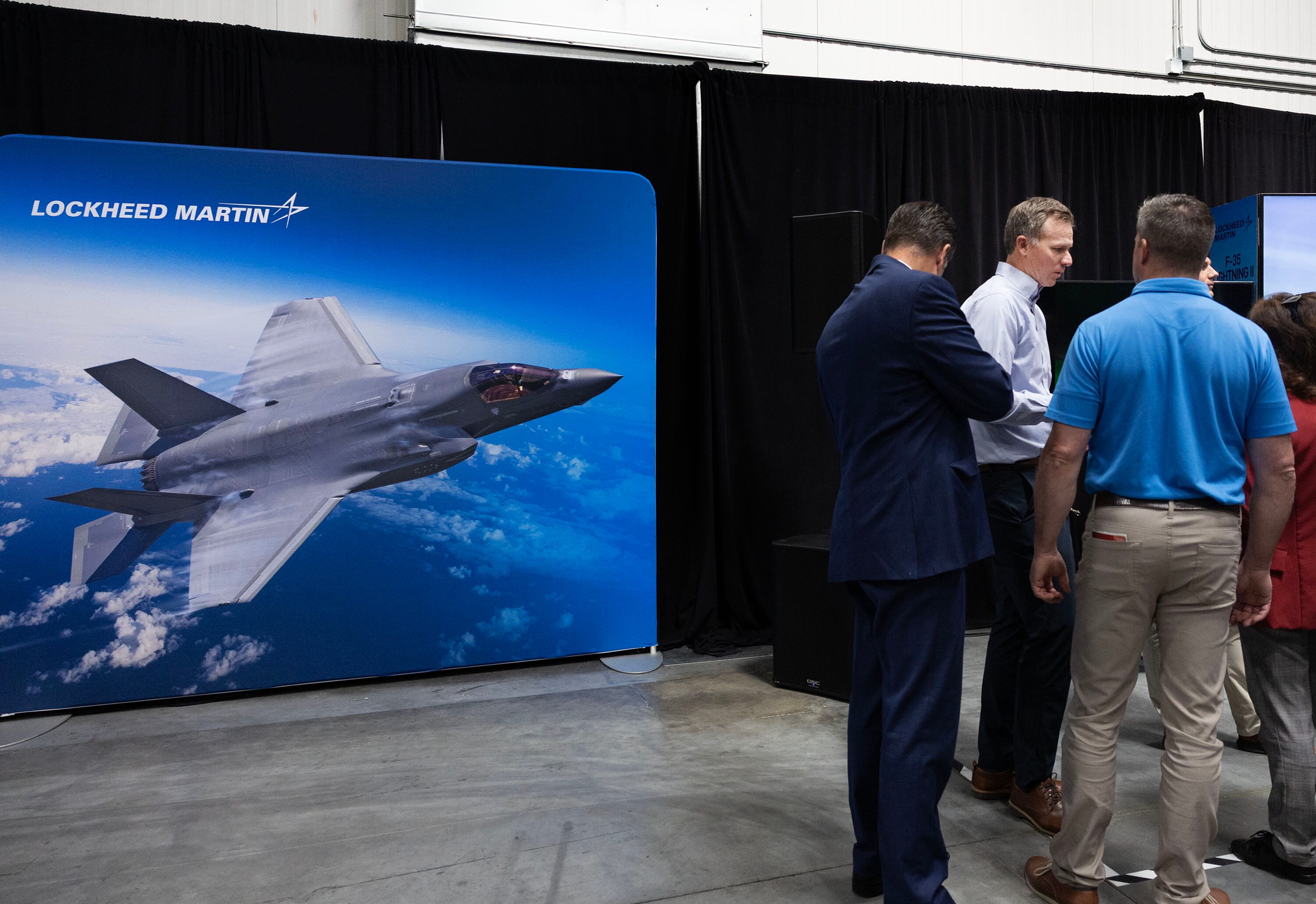 Rep. Blake Moore, R-Utah, speaks at an event highlighting F-35s in Layton on Thursday. Moore tried his hand — albeit virtually — at flying an F-35 at the event.