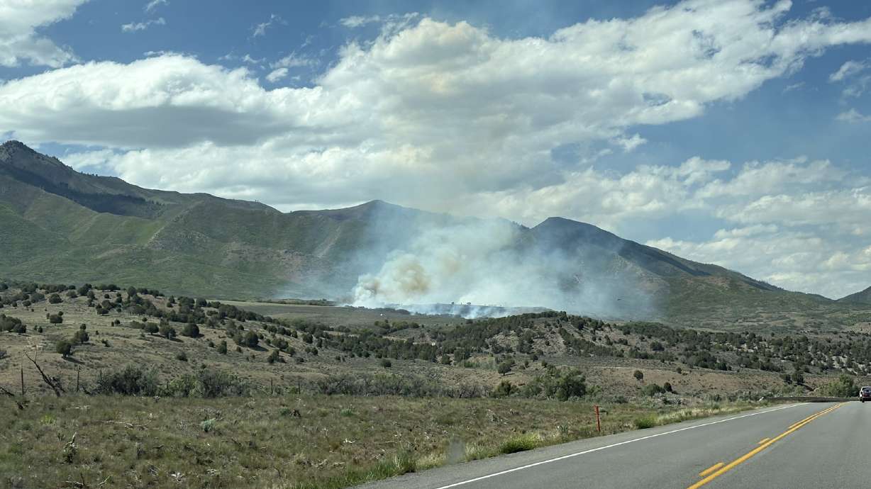 Officials say a new wildfire burning Thursday in an unincorporated area of Utah County is human-caused.